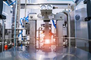 General view of the interior of a milk factory. Equipment at dairy plant. photo