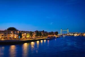 Rotterdam cityscape with De Hef bridge and Noordereiland at nigh photo