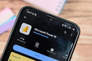 Microsoft Power BI application on Smartphone screen. Power BI is a freeware web browser developed by Microsfot Corporation. Bekasi, Indonesia, March 8, 2024 photo