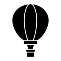 A solid design icon of hot air balloon vector