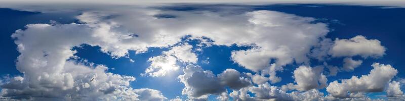 Blue sky panorama with puffy Cumulus clouds. Seamless hdr pano in spherical equirectangular format. Sky dome or zenith for 3D visualization, game and sky replacement for aerial drone 360 panoramas. photo