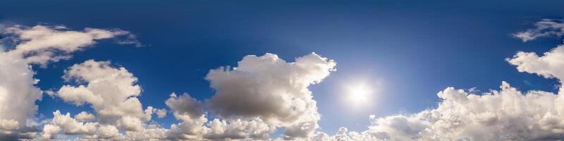 Blue sky panorama with puffy Cumulus clouds. Seamless hdr pano in spherical equirectangular format. Sky dome or zenith for 3D visualization, game and sky replacement for aerial drone 360 panoramas. photo