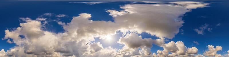 Blue sky panorama with puffy Cumulus clouds. Seamless hdr pano in spherical equirectangular format. Sky dome or zenith for 3D visualization, game and sky replacement for aerial drone 360 panoramas. photo