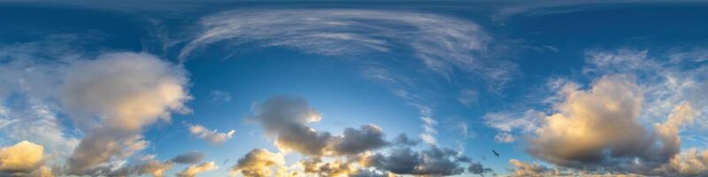 Dark blue sunset sky panorama with Cumulus clouds. Seamless hdr pano in spherical equirectangular format. Complete zenith for 3D visualization, game and sky replacement for aerial drone 360 panoramas. photo