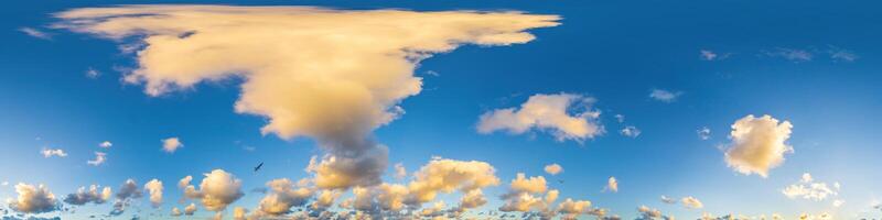 Dark blue sunset sky panorama with Cumulus clouds. Seamless hdr pano in spherical equirectangular format. Complete zenith for 3D visualization, game and sky replacement for aerial drone 360 panoramas. photo