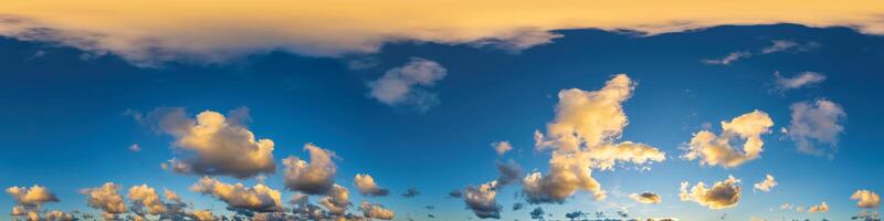 Dark blue sunset sky panorama with Cumulus clouds. Seamless hdr pano in spherical equirectangular format. Complete zenith for 3D visualization, game and sky replacement for aerial drone 360 panoramas. photo