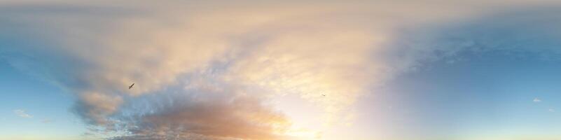 Dark blue sunset sky panorama with Cumulus clouds. Seamless hdr pano in spherical equirectangular format. Complete zenith for 3D visualization, game and sky replacement for aerial drone 360 panoramas. photo