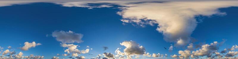 Dark blue sunset sky panorama with Cumulus clouds. Seamless hdr pano in spherical equirectangular format. Complete zenith for 3D visualization, game and sky replacement for aerial drone 360 panoramas. photo