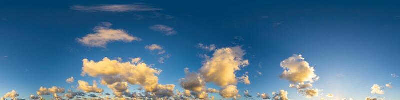 Dark blue sunset sky panorama with Cumulus clouds. Seamless hdr pano in spherical equirectangular format. Complete zenith for 3D visualization, game and sky replacement for aerial drone 360 panoramas. photo