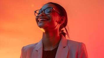AI generated Jubilant Professional Woman Exuding Confidence Against Coral-Tinged Sunset Backdrop, To convey a sense of approachability, confidence, and success in photo