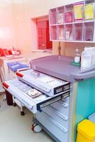 Medical equipment in storage shelves. Modern medicine technology treatment. photo