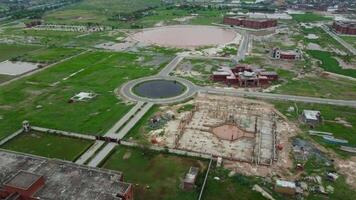 Highway transportation with fields on 2023-07-09 at Sheikhupura in Pakistan video