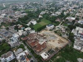 aéreo ver de defensa principal cuadrado, un pequeño pueblo en lahore Pakistán. foto