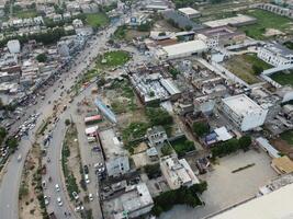 aéreo ver de defensa principal cuadrado, un pequeño pueblo en lahore Pakistán. foto