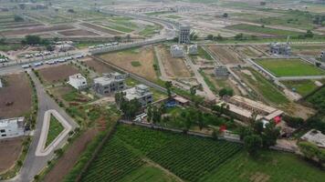 Rectangular shaped settlement of the rich district, looking down aerial view from above Bird eye view villas with pool on 2023-07-22 in Lahore Pakistan video