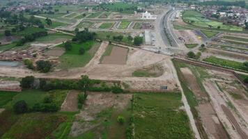 Rectangular shaped settlement of the rich district, looking down aerial view from above Bird eye view villas with pool on 2023-07-22 in Lahore Pakistan video