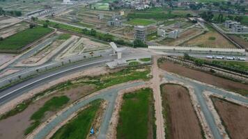 Rectangular shaped settlement of the rich district, looking down aerial view from above Bird eye view villas with pool on 2023-07-22 in Lahore Pakistan video