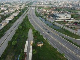 Rectangular shaped settlement of the rich district, looking down aerial view from above Bird eye view villas with pool on 2023-07-22 in Lahore Pakistan photo