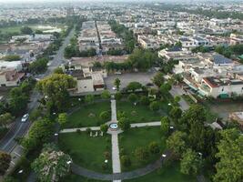 View at city from bird sight. City from drone. Aerial photo. City scape from drone on 2023-07-22 in Lahore Pakistan photo