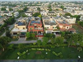 View at city from bird sight. City from drone. Aerial photo. City scape from drone on 2023-07-22 in Lahore Pakistan photo