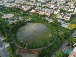 View at city from bird sight. City from drone. Aerial photo. City scape from drone on 2023-07-22 in Lahore Pakistan photo