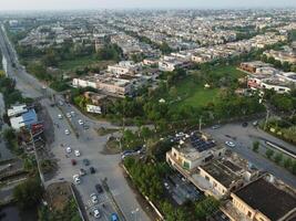 View at city from bird sight. City from drone. Aerial photo. City scape from drone on 2023-07-22 in Lahore Pakistan photo