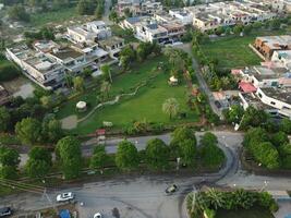 View at city from bird sight. City from drone. Aerial photo. City scape from drone on 2023-07-22 in Lahore Pakistan photo