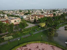 View at city from bird sight. City from drone. Aerial photo. City scape from drone on 2023-07-22 in Lahore Pakistan photo