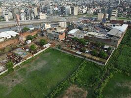 View at city from bird sight. City from drone. Aerial photo. City scape from drone on 2023-07-22 in Lahore Pakistan photo