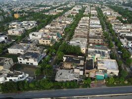 View at city from bird sight. City from drone. Aerial photo. City scape from drone on 2023-07-22 in Lahore Pakistan photo