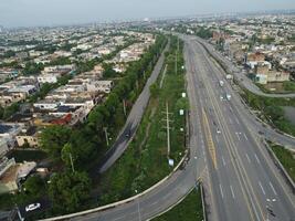 View at city from bird sight. City from drone. Aerial photo. City scape from drone on 2023-07-22 in Lahore Pakistan photo