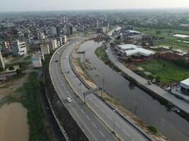 View at city from bird sight. City from drone. Aerial photo. City scape from drone on 2023-07-22 in Lahore Pakistan photo