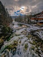 waterfall breakdown, frozen waterfall at winter, Carpathian. Ukraine. photo