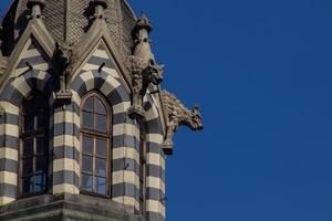 Detail of the historic, Gothic Revival style, Rafael Uribe Uribe Palace of Culture located at the Botero Square in Medellin declared National Monument of Colombia in 1982. photo
