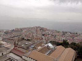 Panorama of Naples from Castel Sant'Elmo offers a breathtaking view of the city's vibrant streets, historic landmarks, and the mesmerizing beauty of the Bay of Naples photo