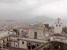 Panorama of Naples from Castel Sant'Elmo offers a breathtaking view of the city's vibrant streets, historic landmarks, and the mesmerizing beauty of the Bay of Naples photo