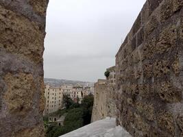 Panorama of Naples from Castel Sant'Elmo offers a breathtaking view of the city's vibrant streets, historic landmarks, and the mesmerizing beauty of the Bay of Naples photo