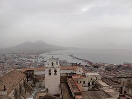 Panorama of Naples from Castel Sant'Elmo offers a breathtaking view of the city's vibrant streets, historic landmarks, and the mesmerizing beauty of the Bay of Naples photo