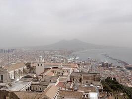 Panorama of Naples from Castel Sant'Elmo offers a breathtaking view of the city's vibrant streets, historic landmarks, and the mesmerizing beauty of the Bay of Naples photo