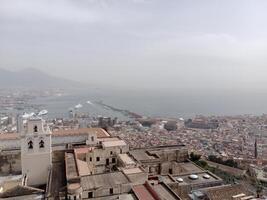 Panorama of Naples from Castel Sant'Elmo offers a breathtaking view of the city's vibrant streets, historic landmarks, and the mesmerizing beauty of the Bay of Naples photo