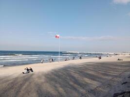 Taking a stroll along the port and pier in Kolobrzeg, Poland, offers a delightful experience with picturesque views of the Baltic Sea and the bustling maritime activity. photo