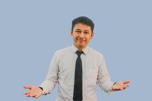 Adult Asian man smiling excited while open arms for greeting photo