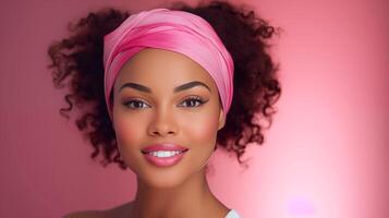 ai generado en contra un suave beige y rosado fondo, un hermosa joven africano -americano mujer con impecable, brillante piel usa un vibrante rosado venda foto