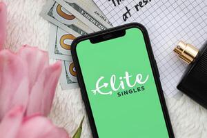 KYIV, UKRAINE - FEBRUARY 23, 2024 Elite Singles logo of famous dating website or app on iPhone display photo