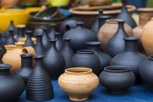 Clay vessels of different colors. Ceramics photo