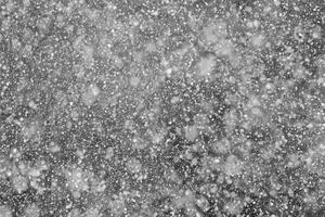 Falling Snowflakes on a Black Background, Enhance Your Project with Snowy Texture. Use as a 'Screen' Layer in Photo Editor for Effortless Snow Integration.