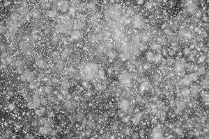 Falling Snowflakes on a Black Background, Enhance Your Project with Snowy Texture. Use as a 'Screen' Layer in Photo Editor for Effortless Snow Integration.