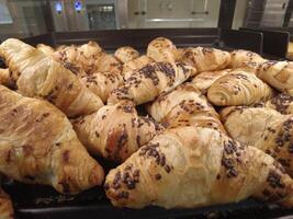 Fresh Croissant on tray photo