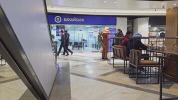 customers walking inside ZUM Aichurok mall in Bishkek video