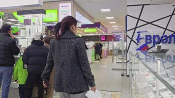 customers walking inside ZUM Aichurok mall in Bishkek video